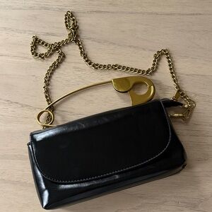 Gold safety pin handbag